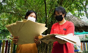 Close-up of the process of 'turning' elephant dung into paper at Saigon Zoo and Botanical Garden