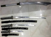 Bắt giam nhóm tín dụng đen thủ nhiều súng, mã tấu