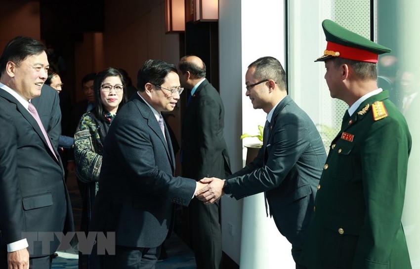 Prime Minister Pham Minh Chinh and his wife begin an official visit to Singapore Photo 2