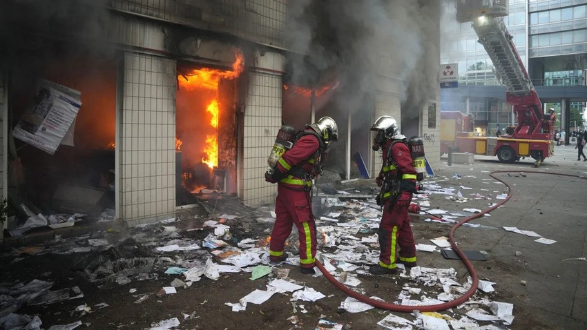 What led to recent violent protests in France?  4 . photo